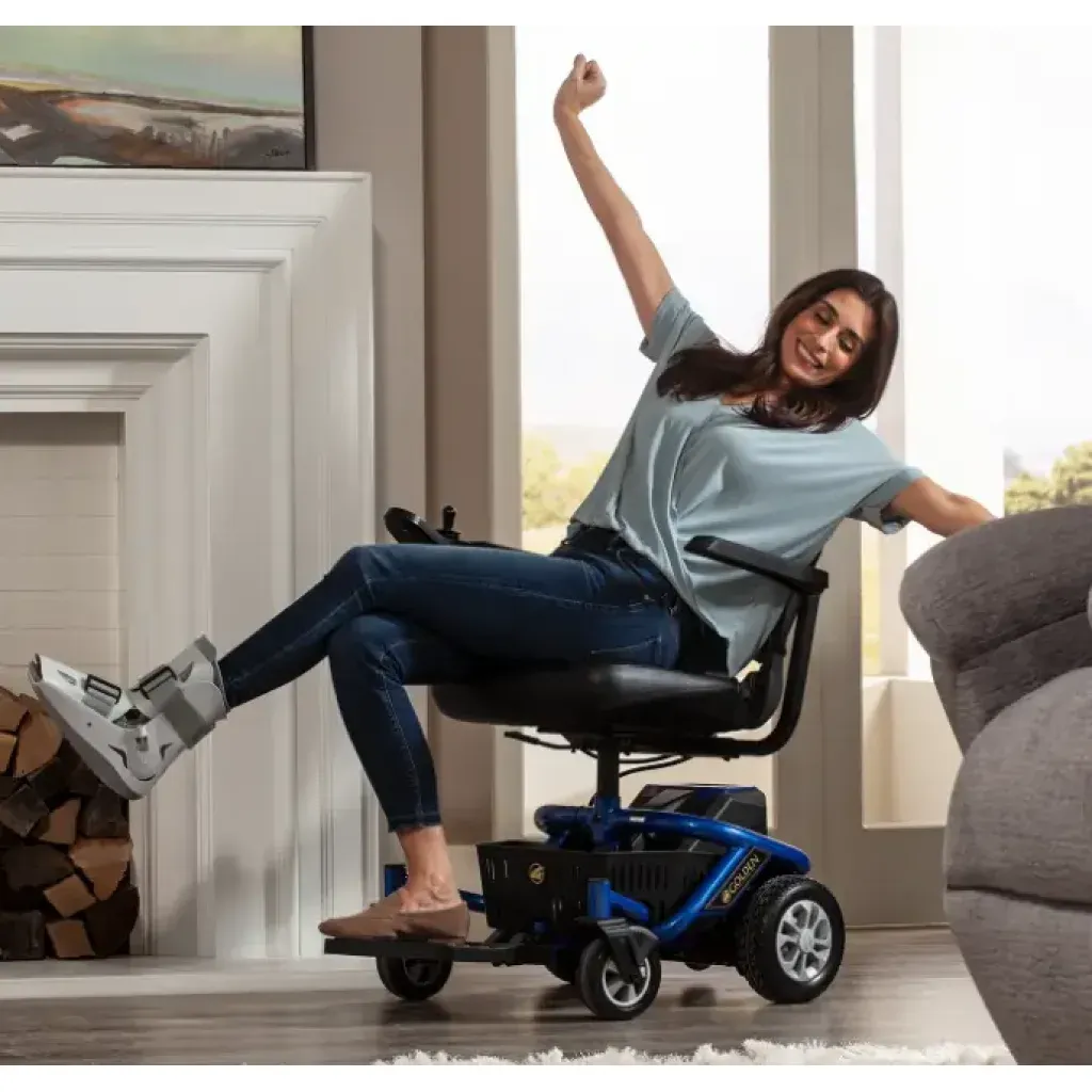 Envy electric wheelchair used indoors in a home, showing compact powered mobility for daily living.